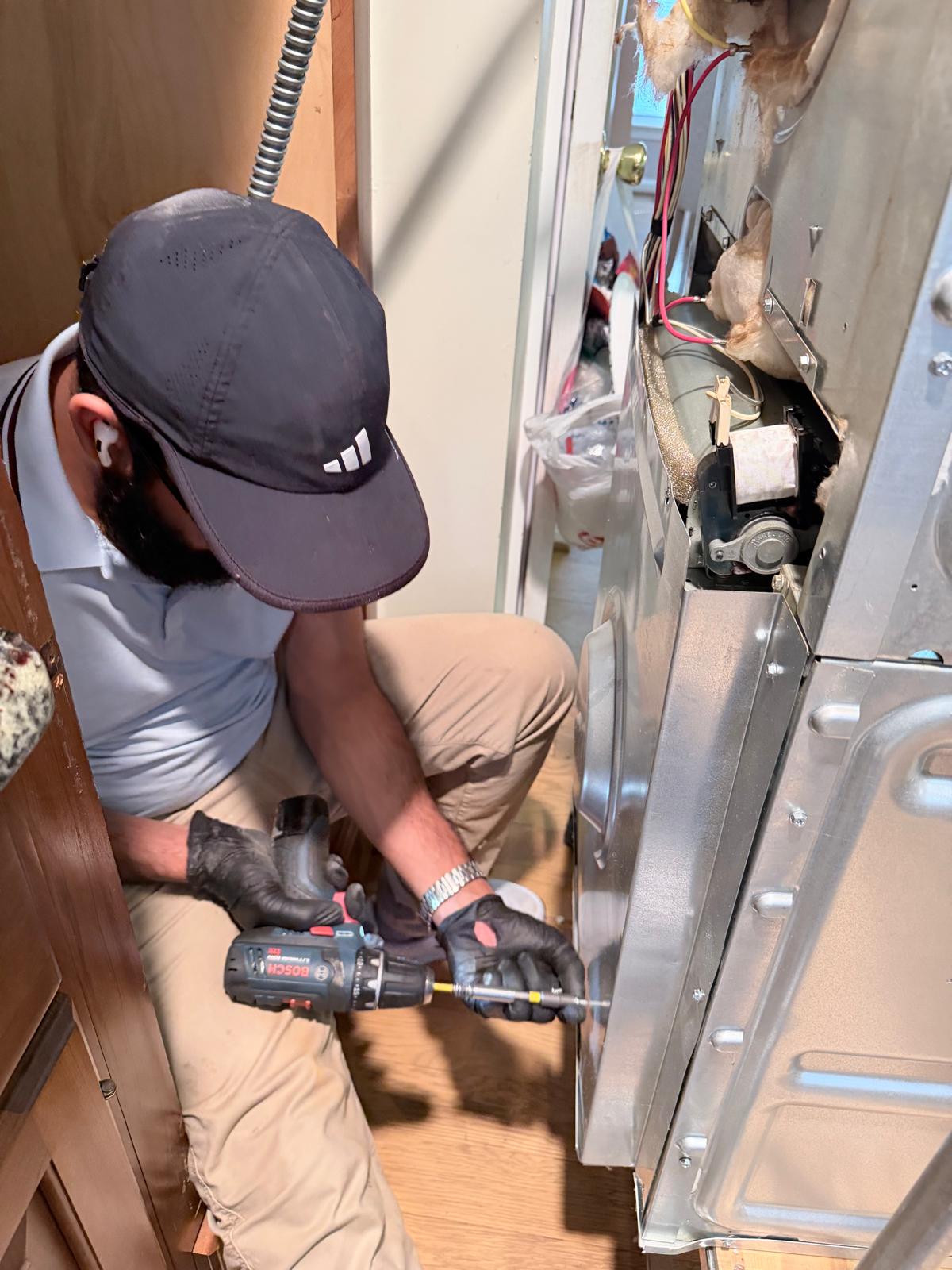OnSpot technician repairing a dryer — Northern Virginia